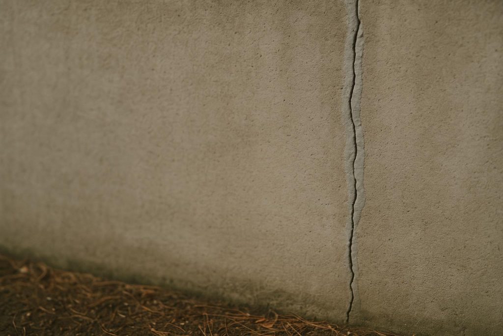 Close-up of an epoxy-sealed foundation crack for foundation crack repair.